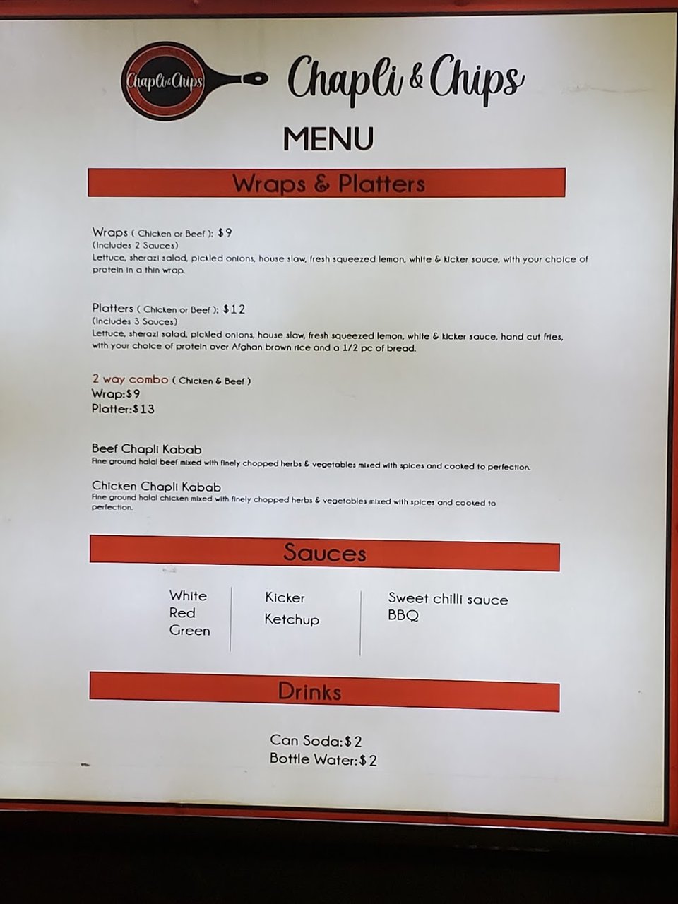 Menu board with platters, wraps, and fries